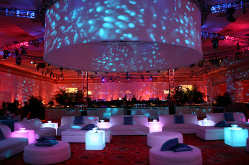 Corporate event lounge with lighting and seating