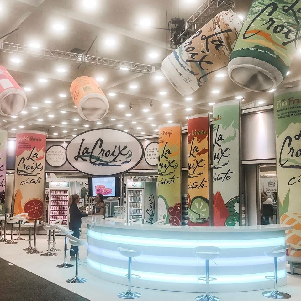 LaCroix custom exhibit with hanging can sculptures